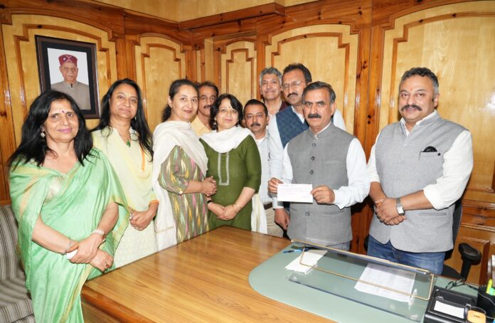 Cheque 1.61 Lakh Principal RKMV Shimla